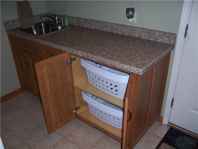 Concealed clothes baskets for sorting